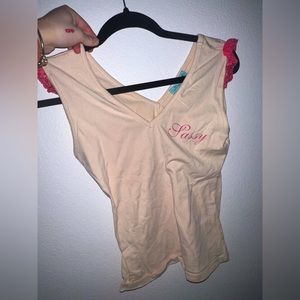 Sassy 2000’s baby tee with lace detailing.